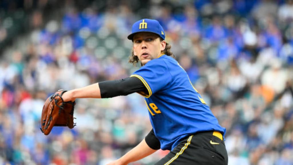 Logan Gilbert winding up to pitch.